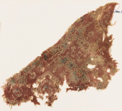 Textile fragment with ornate medallion and lobed squarefront