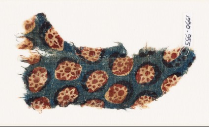 Textile fragment with rosettes in circlesfront