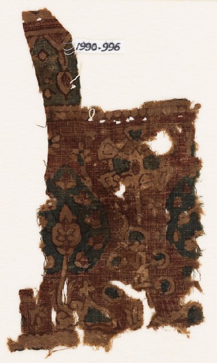 Textile fragment with trees and flowering bushfront