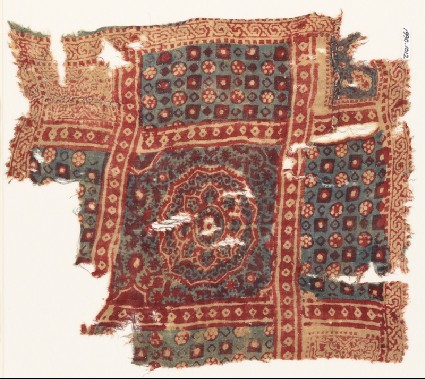 Textile fragment with large medallion, squares, and rosettesfront