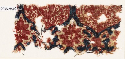 Textile fragment with medallions, tendrils, and vine leavesfront