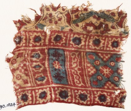 Textile fragment with stars and diamond-shapesfront