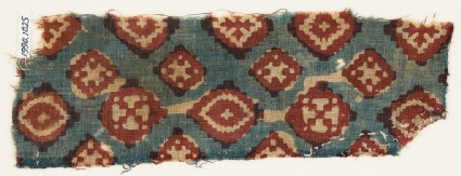 Textile fragment probably imitating patola pattern, with diamond-shapes and crossesfront