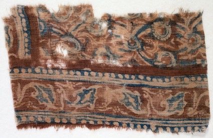 Textile fragment with leaves and linked flowersfront