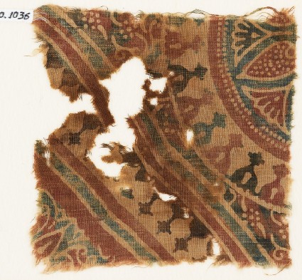Textile fragment with stylized bodhi leaves, rosettes, and tendrilsfront