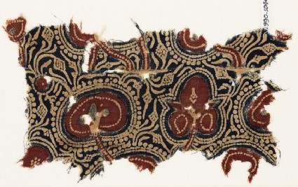 Textile fragment with plants, tendrils, and fruitfront
