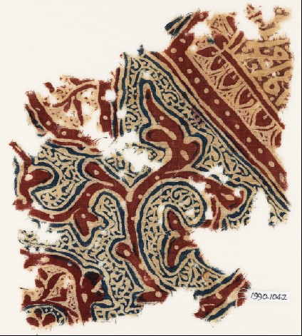Textile fragment with tendrils and scriptfront
