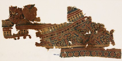 Textile fragment with tendrils, leaves, and rosettesfront