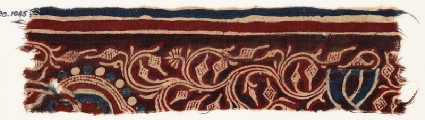 Textile fragment with vine, tendrils, and fruitfront