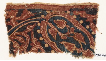 Textile fragment with stem, tendrils, and bunches of fruitfront