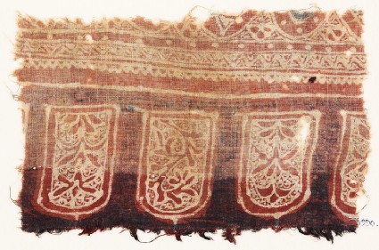 Textile fragment with tab-shapes and plantsfront