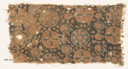 Textile fragment with circles, rosettes, and crossesfront