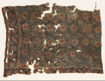 Textile fragment with flower-heads and tendrilsfront