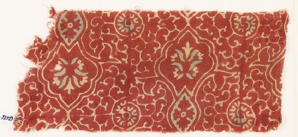 Textile fragment with tendrils, ovals, and flowersfront