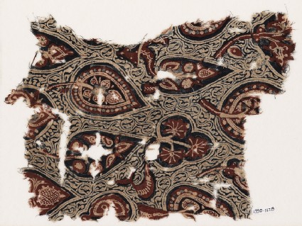 Textile fragment with stylized trees or leavesfront