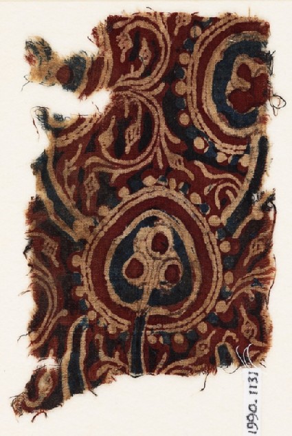 Textile fragment with stylized trees, and fruits or flowersfront