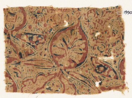 Textile fragment with medallion and plantfront