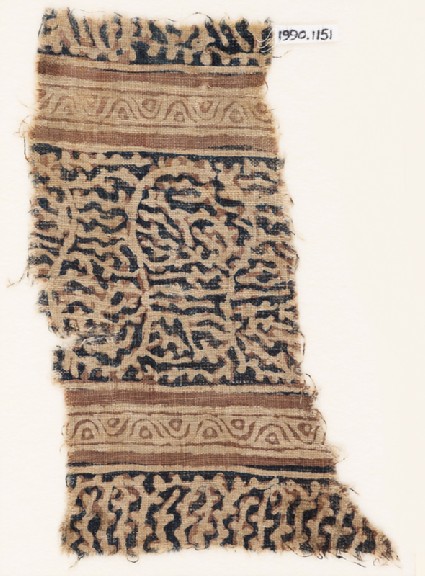 Textile fragment with interlacing tendrils and vinesfront