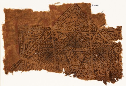 Textile fragment with star, chevrons, and flowersfront