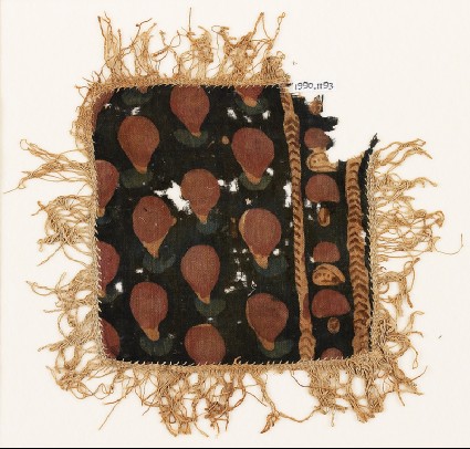 Textile fragment with dots, chevrons, and fringe, possibly from a place-mat or jar coverfront