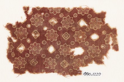 Textile fragment with rosettes, dots, and small squaresfront