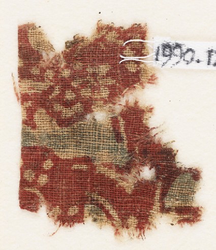 Textile fragment, probably with floral designfront