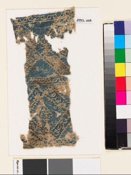 Textile fragment with diamond-shapes and floral patternsfront