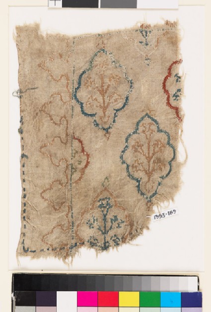 Textile fragment with lobed medallions, plants, and flowersfront