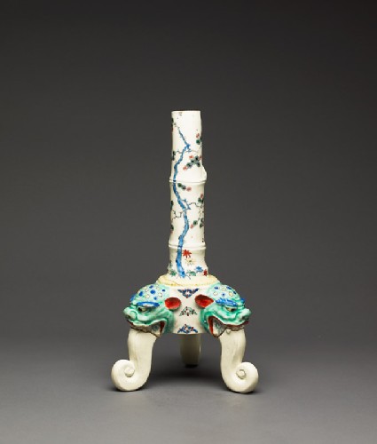 Tripod candlestick with three shishi heads and floral decorationside