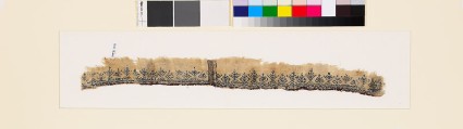 Textile fragment with stylized plants and pseudo-inscriptionfront