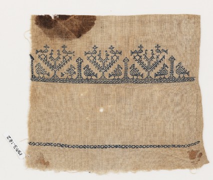 Textile fragment from a towel with stylized birdsfront