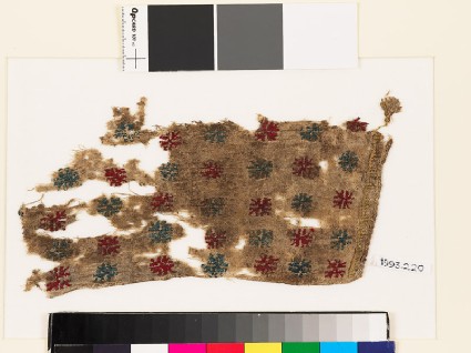 Textile fragment with stars and trianglesfront