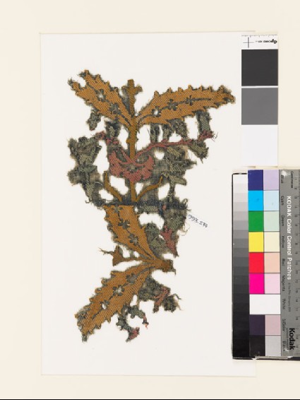 Textile fragment with pairs of leaves and bell-shaped flowersfront