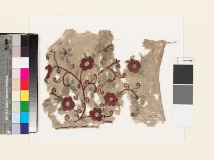 Textile fragment with floral sprayfront