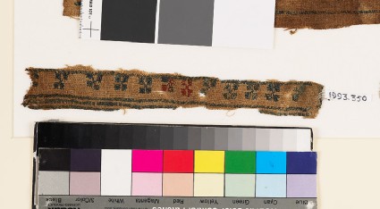 Textile fragment with bands of diagonal crossesfront