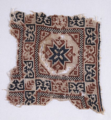 Textile fragment with star and pseudo-inscriptionfront