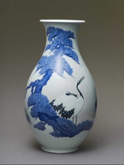 Inverted baluster vase with two cranesside