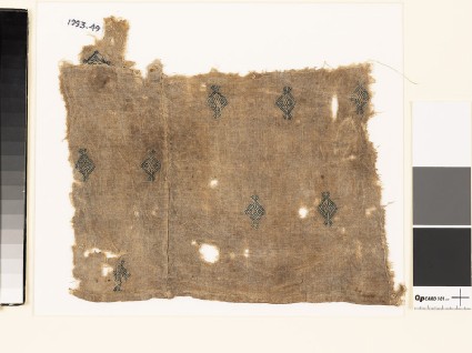 Textile fragment with diamond-shapes and palmettes, probably from a tunicfront