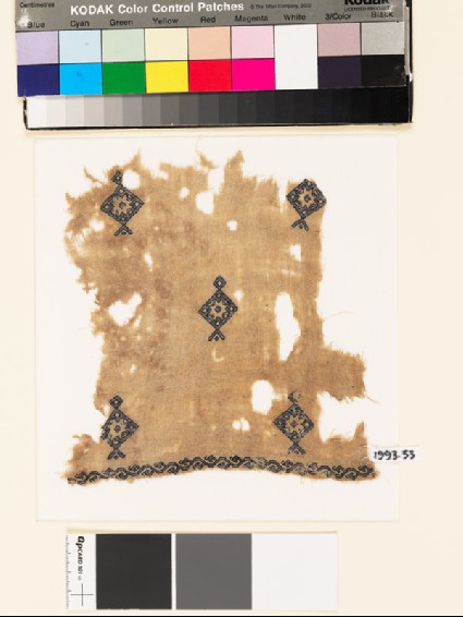 Textile fragment with diamond-shaped medallions and starsfront