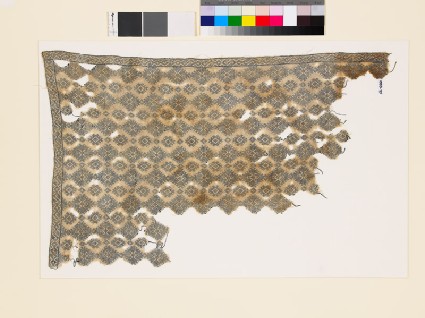 Textile fragment with diamond-shapes and geometric patternsfront