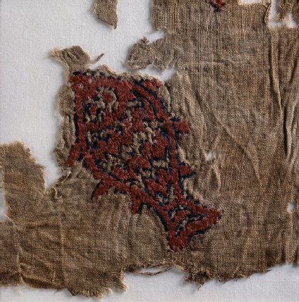 Textile fragment with fishdetail, front