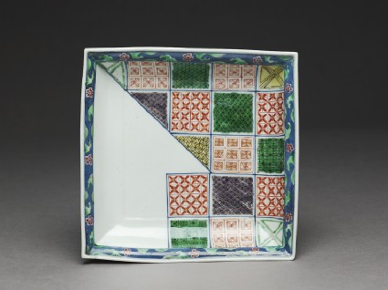 Plate with geometric decoration in the style of textile patternstop