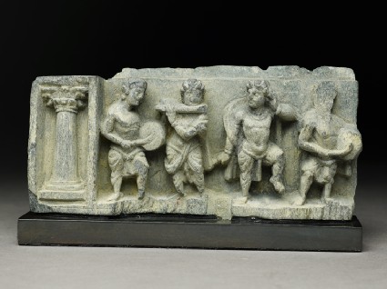 Relief fragment depicting a dancer and three musiciansfront