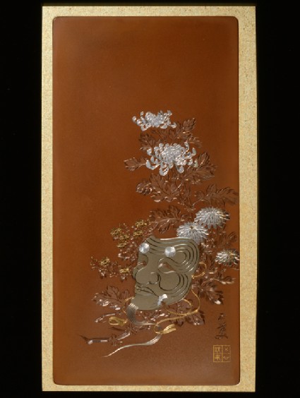Panel with a mask of Okina lying on flowersfront