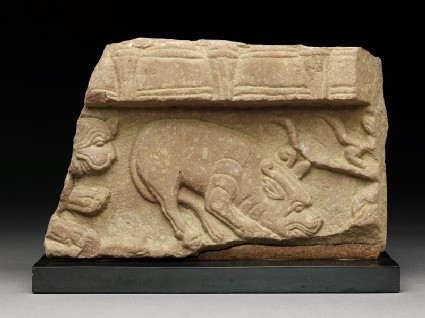 Fragment of a coping stone with horned mythical creaturefront