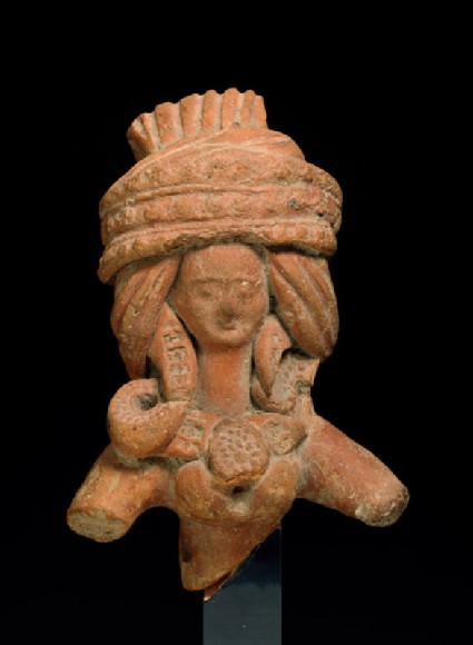 Figure of a mother goddess with massive coiffurefront