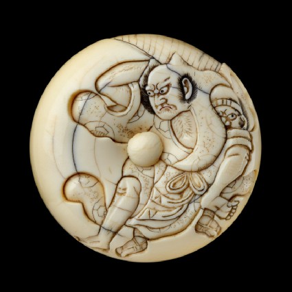 Manjū netsuke depicting Tadanobu defending himself with a gō boardfront