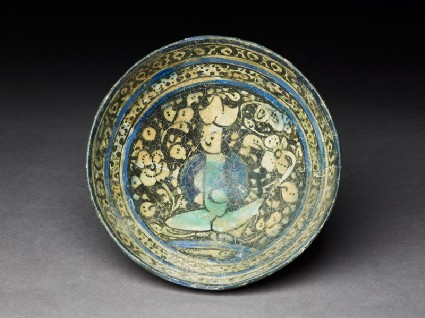 Bowl with seated figuretop