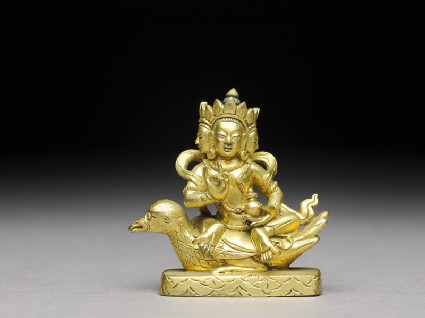 Figure of a bodhisattva seated on a birdfront