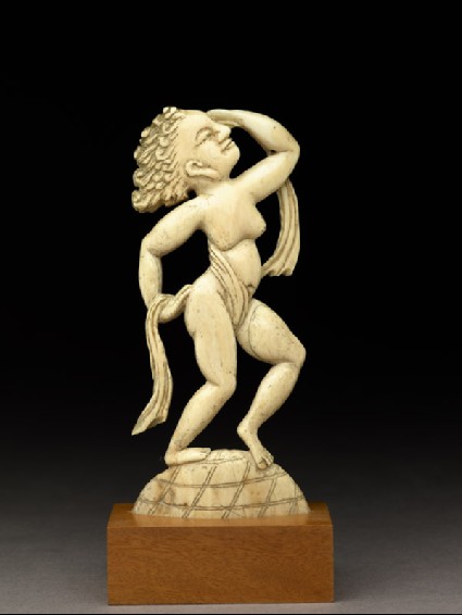 Figure of a female nude, and box containing a textile with double-dorje wax sealfront